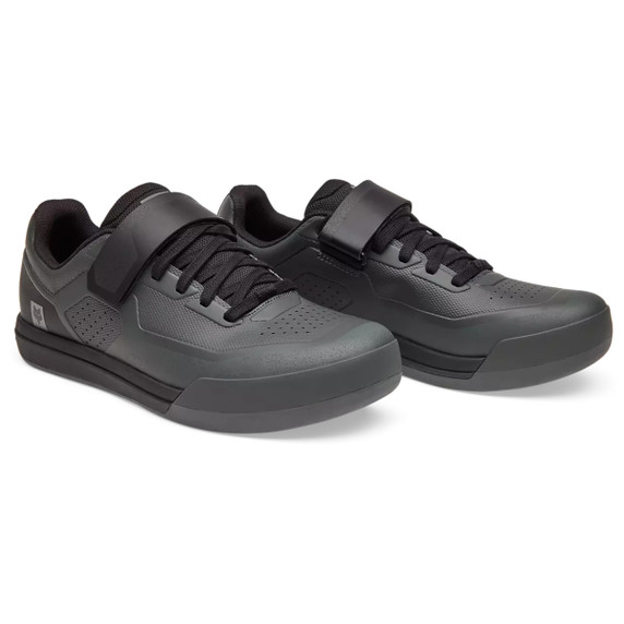 Grey and black lace up mountain bike shoes with velcro retention strap