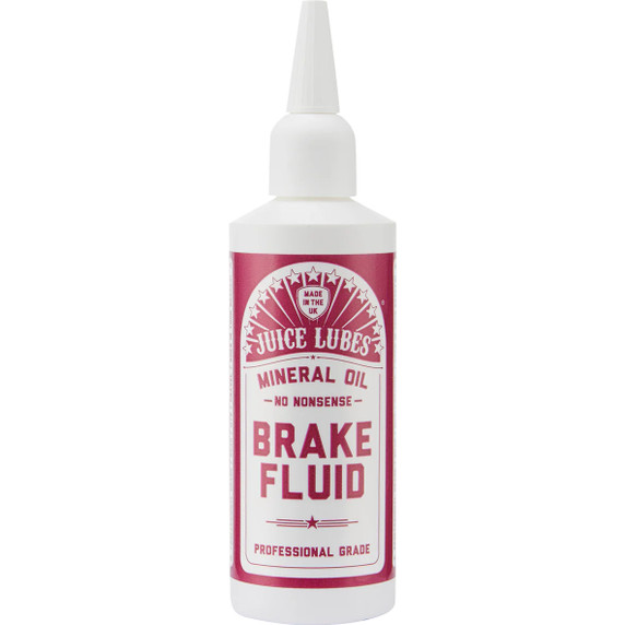 White bottle of mineral oil with pink sticker