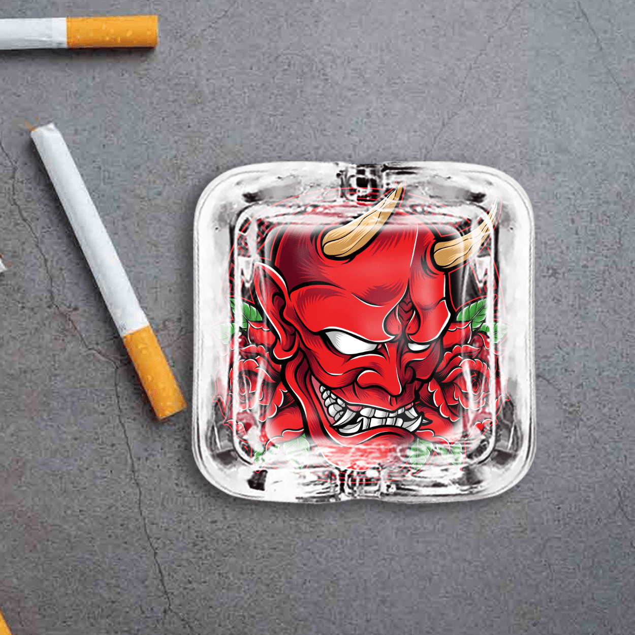 A square custom glass ashtray with a logo