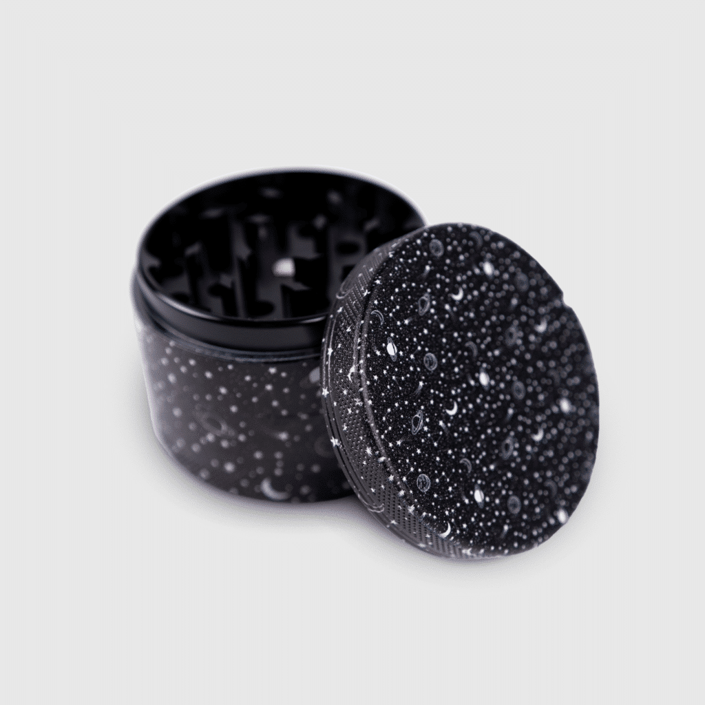 Close-up of the all over print grinder, showing its sharp teeth and durable construction.