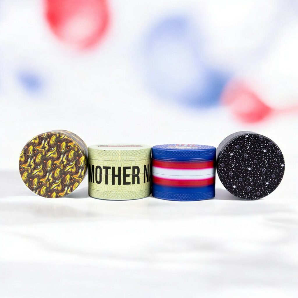 A collection of custom grinders with vibrant, all-over print designs.