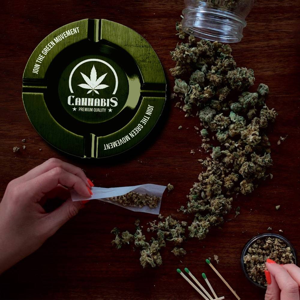 A custom round tin ashtray made from premium tin material with joint holders.
