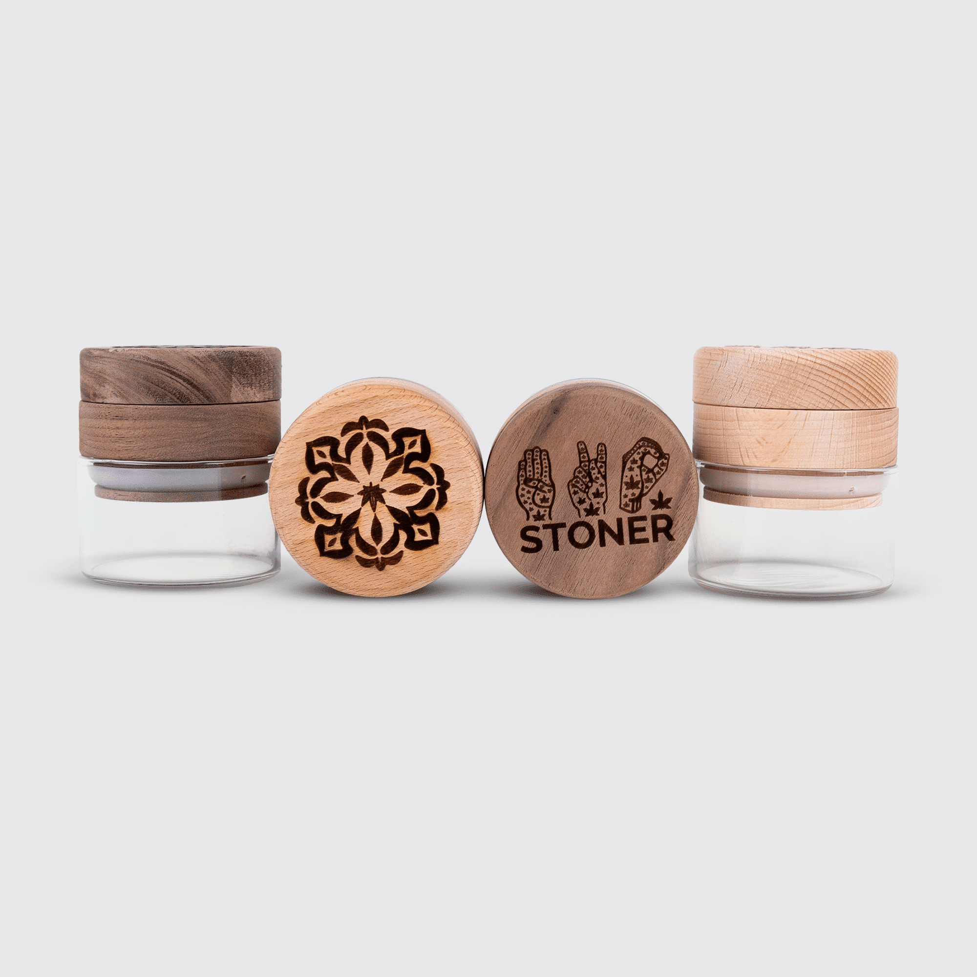 Custom engraved wooden grinders in both beech and walnut wood finishes.