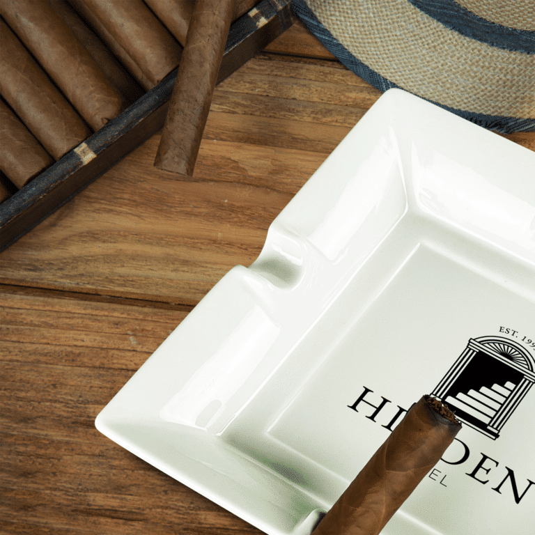 A custom square ceramic ashtray with a branded logo, perfect for promotions.