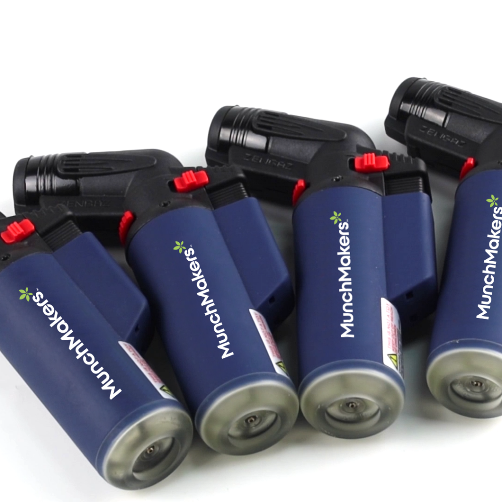 A group of custom TorchIt compact torch lighters.