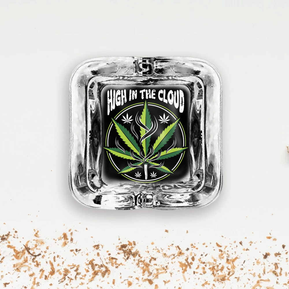 A square glass ashtray with a cannabis leaf design, a great addition to any collection.