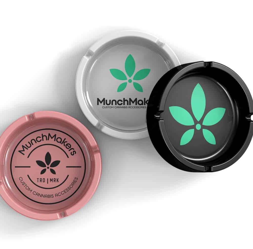 A stylish custom ceramic ashtray with a logo.