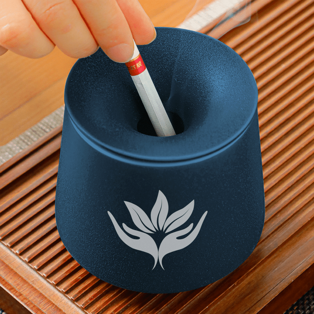 A navy ceramic ashtray with a lid, perfect for marketing and giveaways.