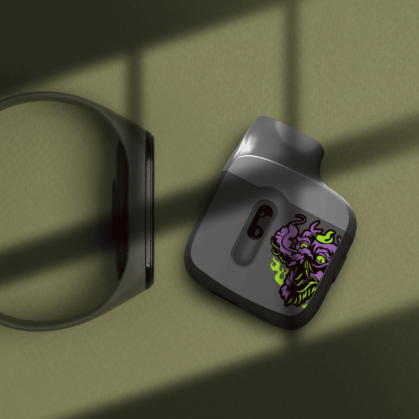 Stylish earbud case with mythical design and minimalist wristband on olive green background.