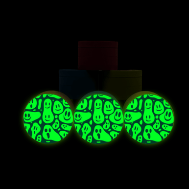 Custom GlowGrind glow-in-the-dark grinder illuminating in darkness