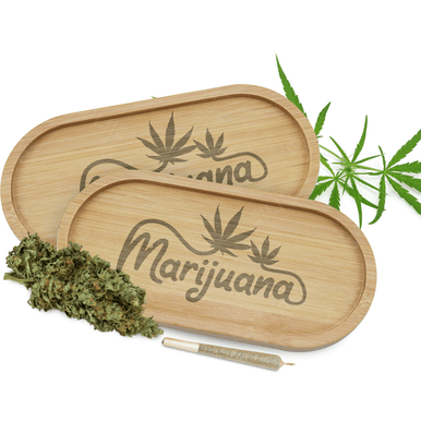 Mini bamboo oval rolling tray showing natural grain and compact size