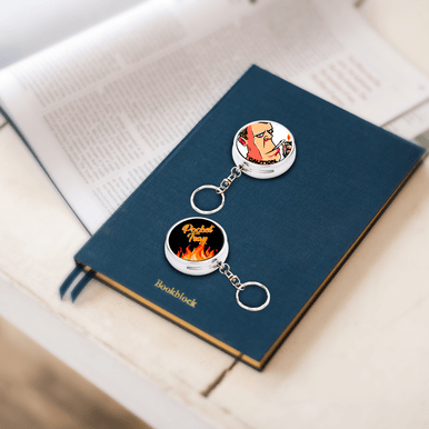 Portable metal ashtray keychain showing compact size and attachment