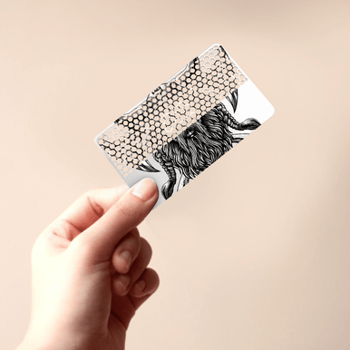 Custom grinder card with whimsical creature and honeycomb pattern design