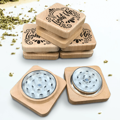 Square wooden grinder showing natural grain and ergonomic design