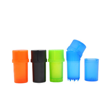 Plastic stash grinder showing bottom storage compartment