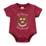 Harvard Future Freshman baby onesie in maroon with Harvard shield graphic.