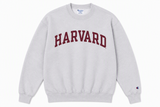Silver Champion Reverse Weave crewneck sweatshirt featuring embroidered Harvard University arch logo and Champion sleeve logo.