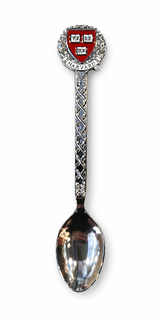 Harvard souvenir spoon with crimson crest, ornate silver-tone handle and polished spoon bowl.