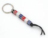 Boston block letter keychain with red, white and blue cube letters, black cord and silver-tone key ring.