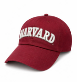 Harvard university embroidered word cap in maroon, with adjustable for and curved brim.