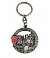 Silver-tone Boston Massachusetts keychain featuring Paul Revere, the city skyline and a red spinning lobster