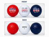 Three commemorative USA 250th Anniversary golf balls in a clear display gift box featuring red, white, and navy patriotic designs with "USA Est. 1776" and "1776–2026 United States of America 250th Anniversary" graphics.
