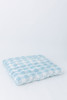 A gingham/buffalo check fabric in color baby blue.