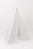 This tent is a black ticking material on white canvas fabric all around. The doors have white pom pom trim.