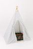 This tent is a black ticking material on white canvas fabric all around. The doors have white pom pom trim.