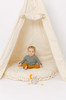 This play tent is made from 100% premium cotton (OEKO-TEX certified) in natural canvas that is 7 oz. The play tent comes with a roll up door.