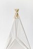 This tent is made of light gray fabric and it is made of 100% premium pima cotton fabric. The tent comes with white pom pom trim and has tie back doors.