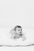 An ivory sherpa fabric that has a lambie textured, super-soft surface