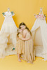 This play tent has a cream base made from 100% premium pima cotton (OEKO-TEX certified) with ivory/cream tulle colored layered doors.