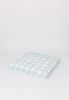 A gingham/buffalo check in color sea foam green.