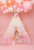 This tent is a cream pima cotton fabric with layers of cream and shades of pink tulle.