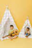 The Rowan Play Tent is a grey gingham/buffalo plaid play tent. This play tent is made from 7 oz. cotton (OEKO-TEX certified) fabric. The play tent comes with tie back doors. It has four wooden poplar rods that hold up a beautifully crafted play tent.