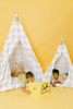 The Rowan Play Tent is a grey gingham/buffalo plaid play tent. This play tent is made from 7 oz. cotton (OEKO-TEX certified) fabric. The play tent comes with tie back doors. It has four wooden poplar rods that hold up a beautifully crafted play tent.