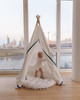 The Tyler Play Tent is very neutral but ready for adventure. This all white play tent is made from 100% premium cotton (OEKO-TEX certified) and denim blue colored binding. The play tent comes with tie back doors. It has four wooden poplar rods that hold up a beautifully crafted play tent.