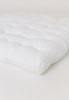 A white sherpa fabric that has a lambie textured, super-soft surface filled with hypoallergenic premium polyester.