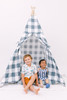 This tent is made of a gunmetal color buffalo check (also known as gingham) and it is made of 100% cotton twill fabric.