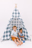 This tent is made of a gunmetal color buffalo check (also known as gingham) and it is made of 100% cotton twill fabric.