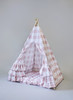 The Bonnie Play Tent is a dark blush pink gingham/buffalo plaid play tent with 3 sets of horizontal ruffles