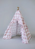 The Brandy Play Tent is a dark blush pink gingham/buffalo plaid play tent with vertical ruffles along the front panels.