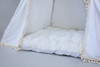 The Elliott tent is classy using white twill cotton with cream tassel fringe on the front panels.