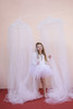 The Tulle canopy is handsewn using 15 yards of the finest crafted tulle available.