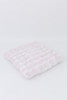 A light pink gingham/buffalo check cotton fabric.