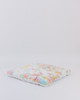 A soft cuddle pastel rainbow tie dye fabric handtufted with premium polyester fiberfill.