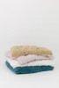 A very soft cuddle llama fur fabric in color rosewater (mauve).