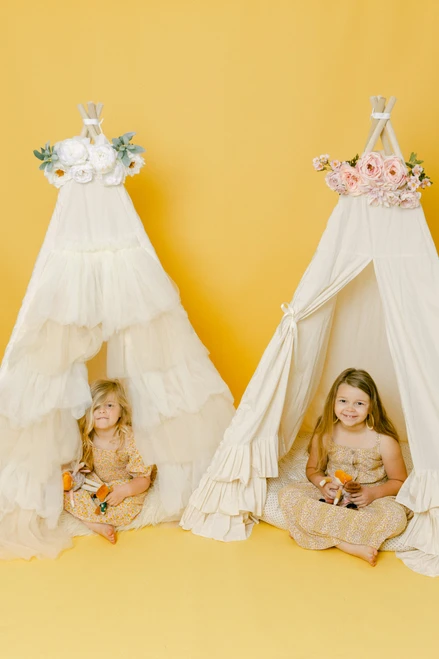 This all cream play tent is made from 100% premium pima cotton (OEKO-TEX certified) fabric that is a gorgeous cream color. The doors have three beautiful hand crafted ruffles.