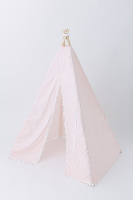 This tent has light pink diagonal stripes, white pom pom trim and it is made of 100% premium cotton fabric.